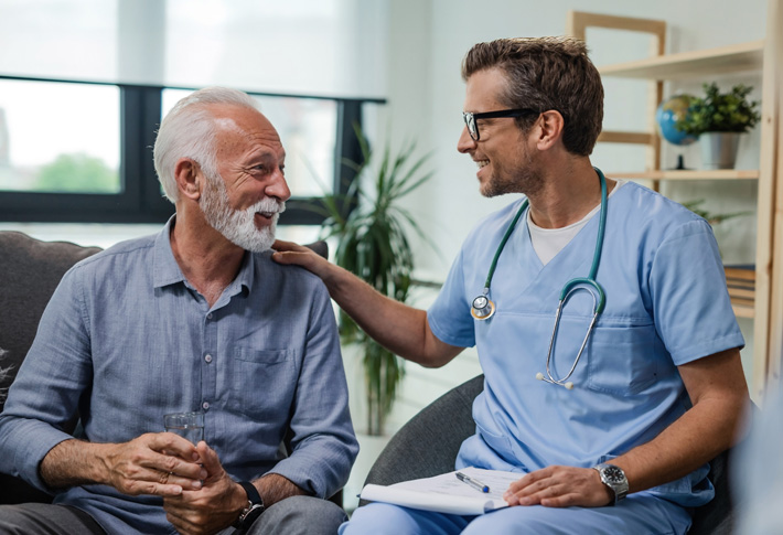 Doctor providing care to an elderly patient